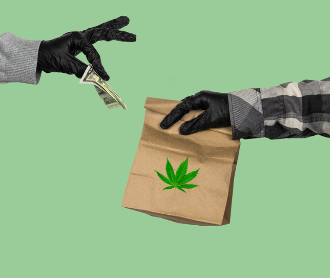 courier's hand in latex gloves holds a paper bag with marijuana leaf and female hand in latex gloves gives